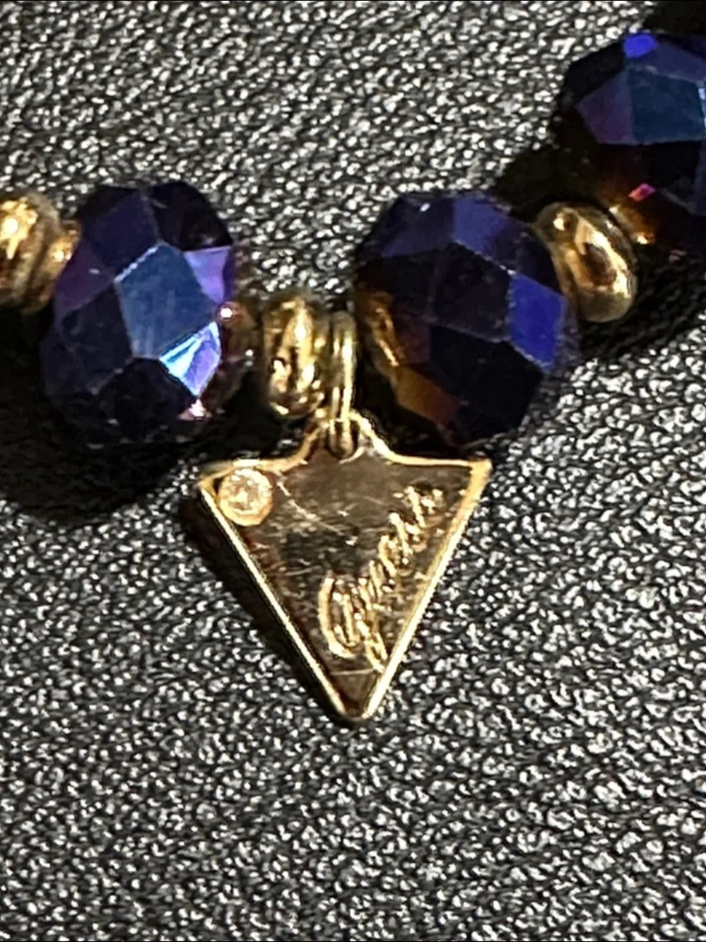 Guess Royal Blue Faceted Crystal Gold Tone Accent Stretch Bracelet